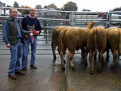 Best Pen of 4 that made £790, Mr R Williamson with Judge Mr C Kennedy