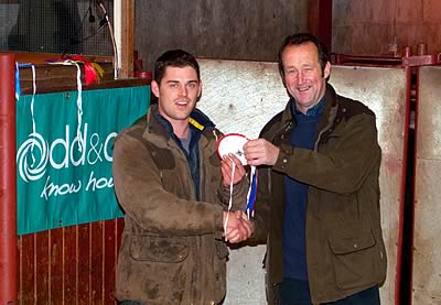 owner of the Champion James Latimer, Rinnion Hills with the judge Jeff Story